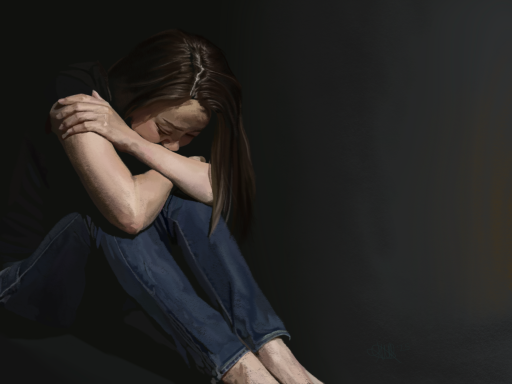 In Darkness, We Come Alive A person sitting on the floor, hugging their knees and looking down in a dark setting.