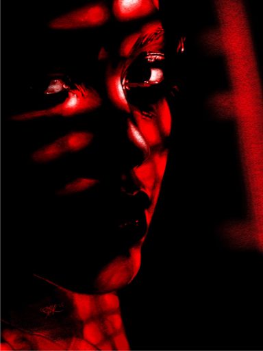 Stand Close-up portrait with shadows and red light creating a dramatic effect.